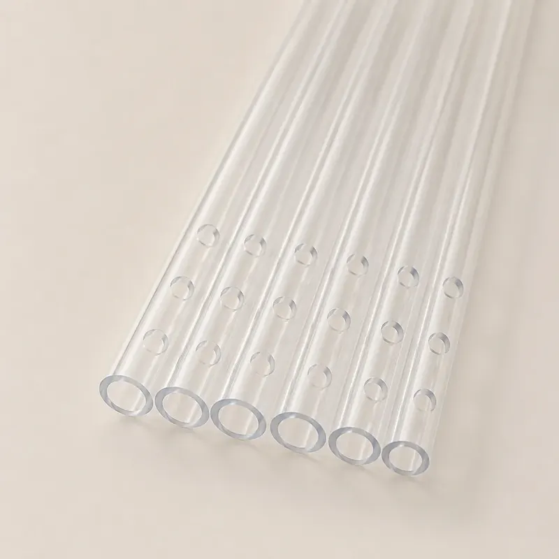 Clear drilled plastic tubes arranged by diameter
