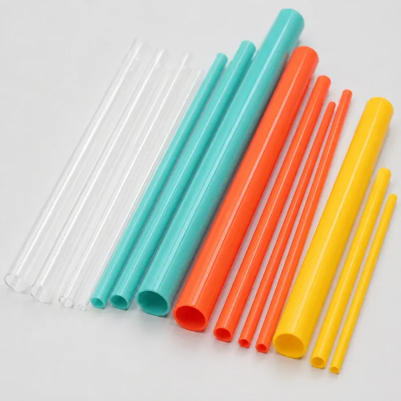 Custom colored ABS round tubes on a white background