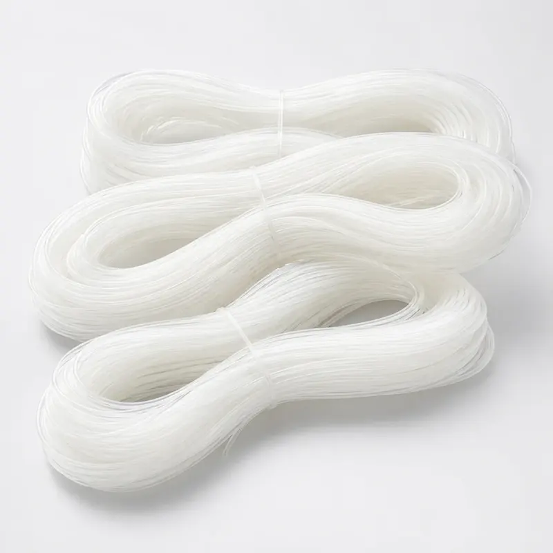 Transparent small-bore PVC capillary tubes arranged in loose coils